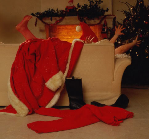 Funny Picture - Santa Enjoys His Work - Christmas Ecard