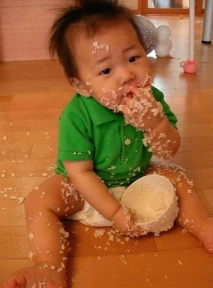 Funny Picture - Making A Mess Of The Rice Bowl!