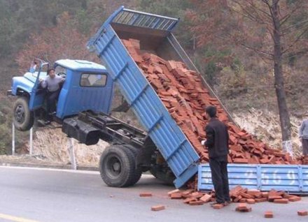 Funny Picture - Dump Truck Mishap
